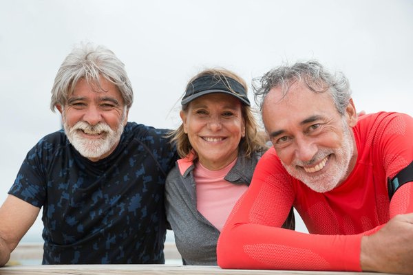 How can UK health professionals support patients in navigating the healthcare system?